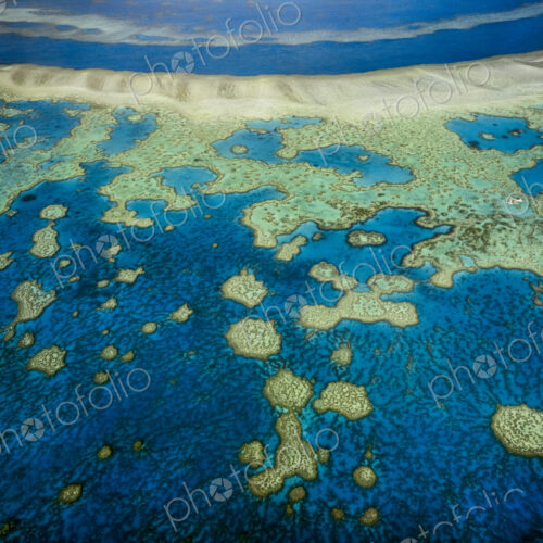 An aerial view of the islands of the Great Barrier Reef in Queensland, Australia An aerial view of the islands of the Great Barrier Reef in Queensland, Australia