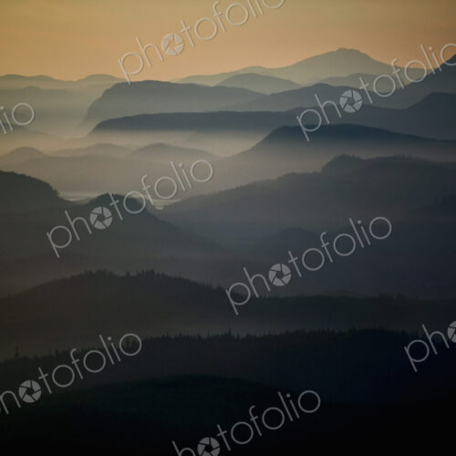 An aerial view of the landscape, islands, water and mountains of the Broughton… An aerial view of the landscape, islands, water and mountains of the Broughton…