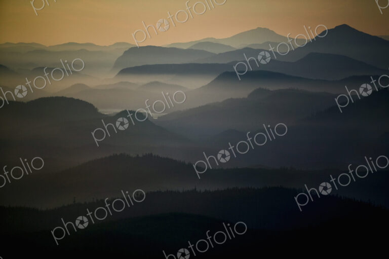 An aerial view of the landscape, islands, water and mountains of the Broughton…