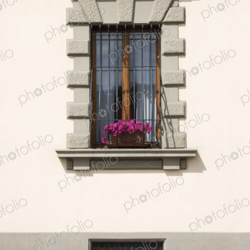 An apartment window on a street in Florence, Italy.
