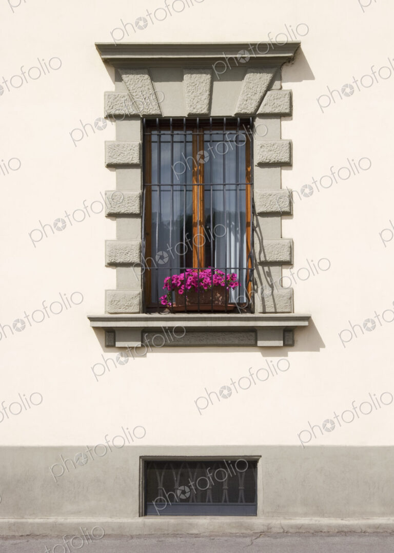 An apartment window on a street in Florence, Italy.