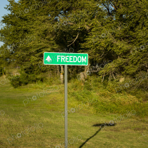 An arrow road sign to Freedom. An arrow road sign to Freedom.