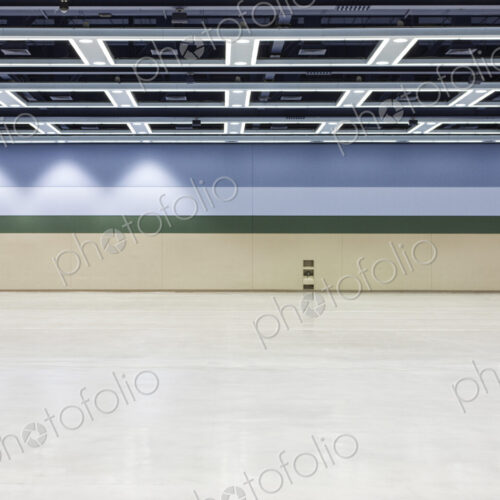 An empty convention center space. An empty convention center space.