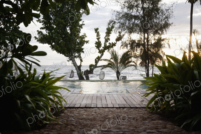 An infinity pool on the coastline of the Gulf of Thailand.
