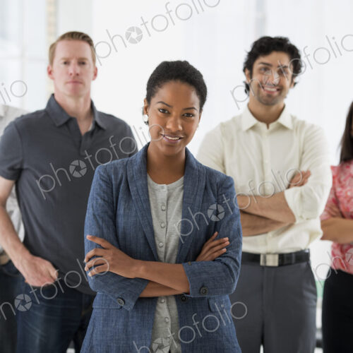 An office in the city. Business. A team of people, a multi ethnic group, men and women…