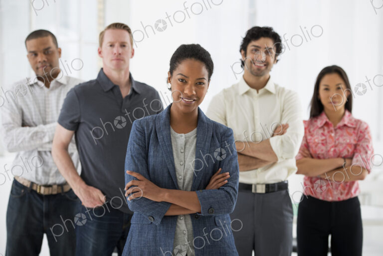 An office in the city. Business. A team of people, a multi ethnic group, men and women…