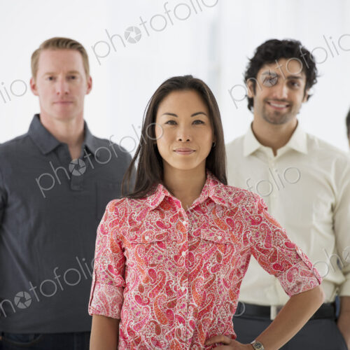 An office in the city. Business. A team of people, a multi ethnic group, men and women…