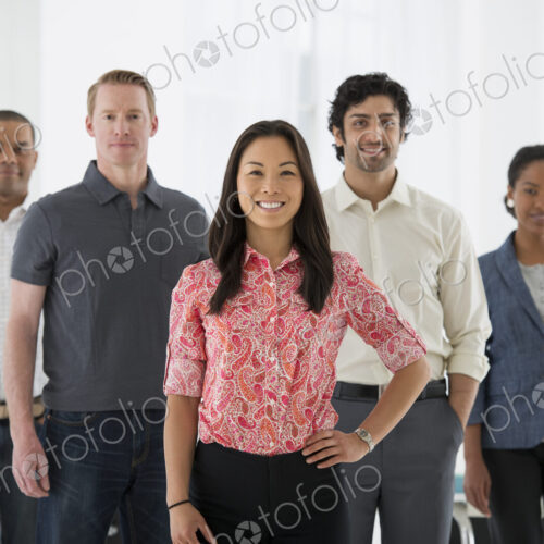 An office in the city. Business. A team of people, a multi ethnic group, men and women…