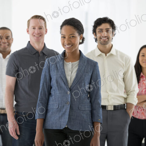 An office in the city. Business. A team of people, a multi ethnic group, men and women…
