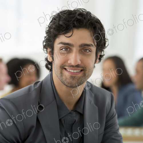 An office in the city. Business. Team meetings. A group sitting down around a table.… An office in the city. Business. Team meetings. A group sitting down around a table.…