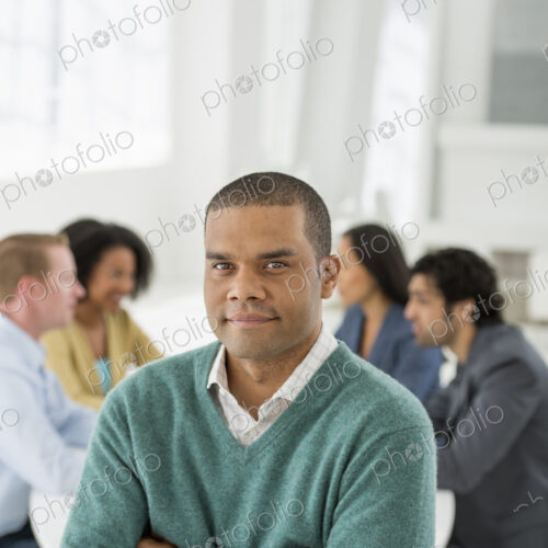 An office in the city. Business. Team meetings. A group sitting down around a table.… An office in the city. Business. Team meetings. A group sitting down around a table.…