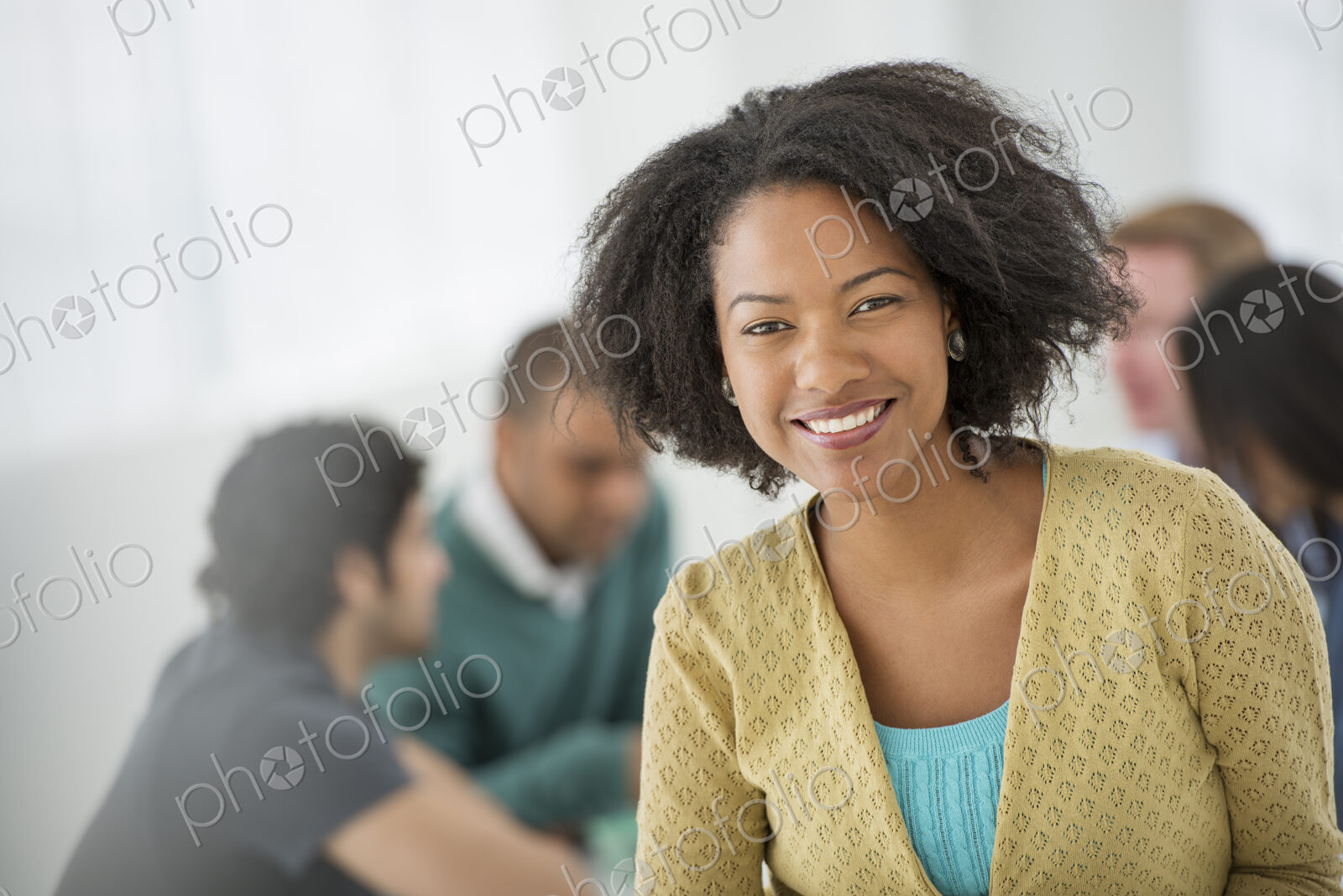 An office in the city. Business. Team meetings. A group sitting down around a table.…