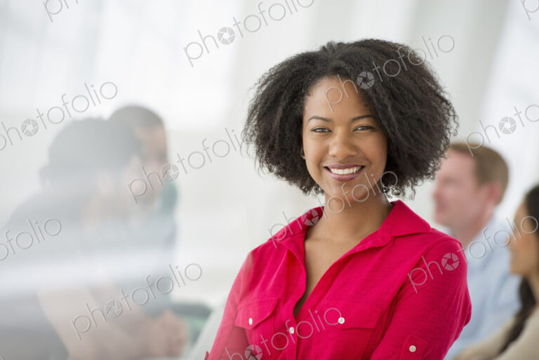An office in the city. Business. Team meetings. A group sitting down around a table.…