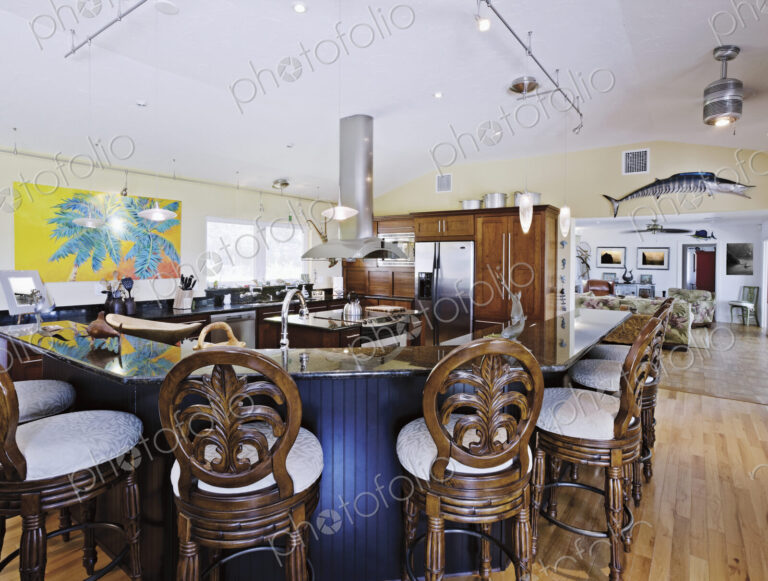 An open plan kitchen diner and breakfast bar