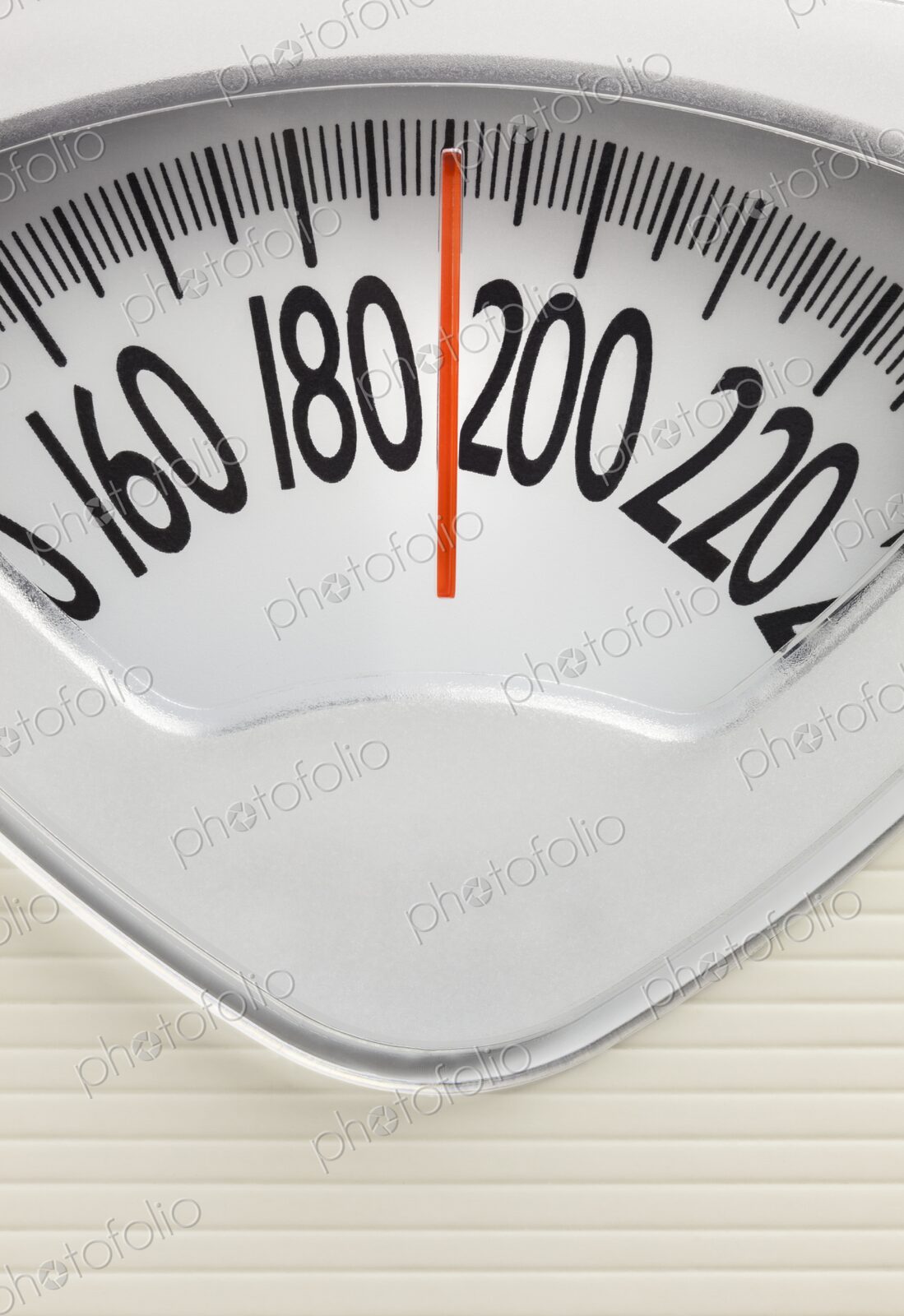 Analog bathroom scale with red needle pointing near 200 pounds. Health, weight…
