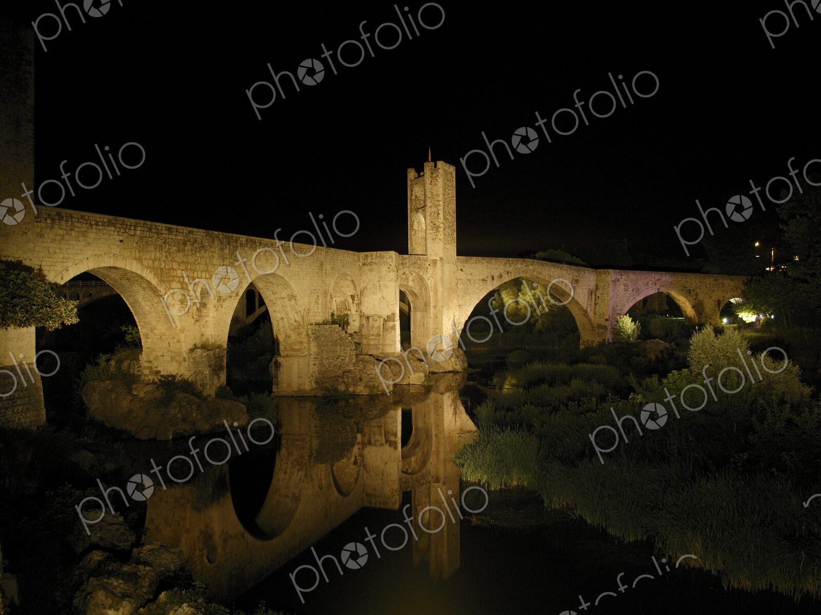Ancient Stone Bridge At Night