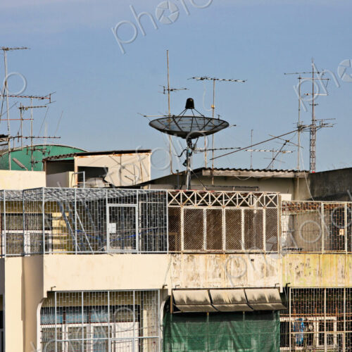 Apartment building with satellite dish