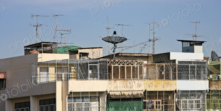 Apartment building with satellite dish