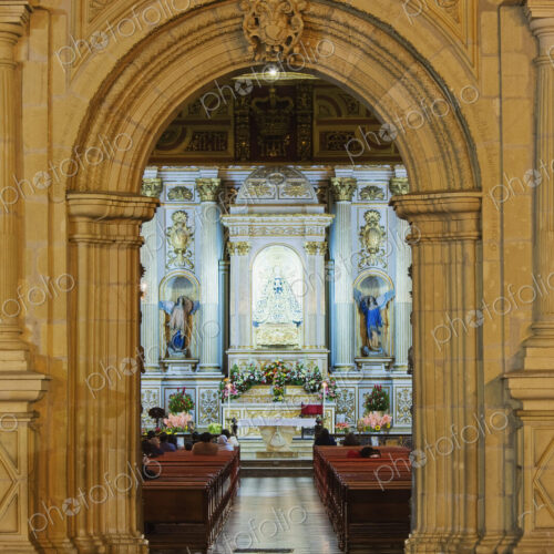 Arched entrance, door to an ornate church interior Arched entrance, door to an ornate church interior