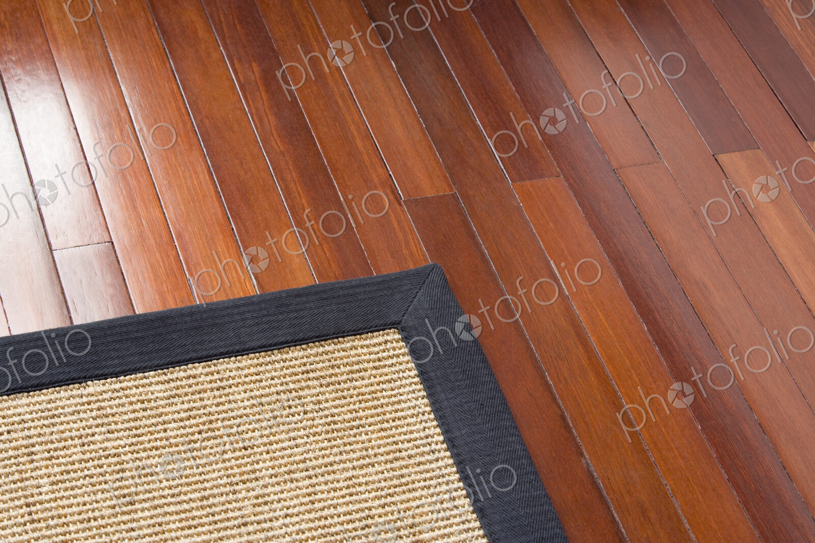 Area Rug on Polished Wood Floor