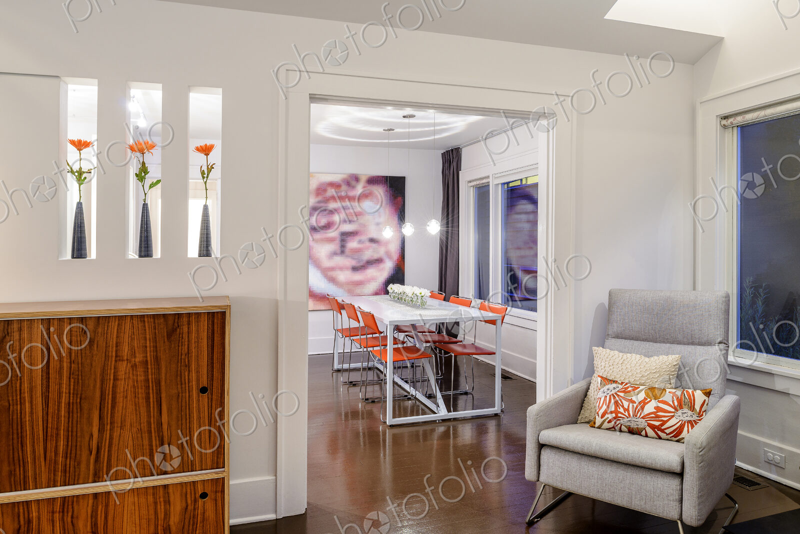 Armchair near entrance to modern dining room