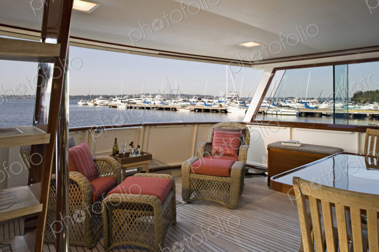 Armchairs in lounge area of yacht