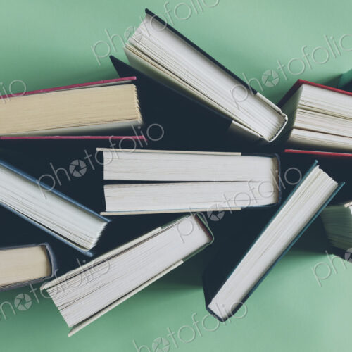 Arrangement of hardback books Arrangement of hardback books