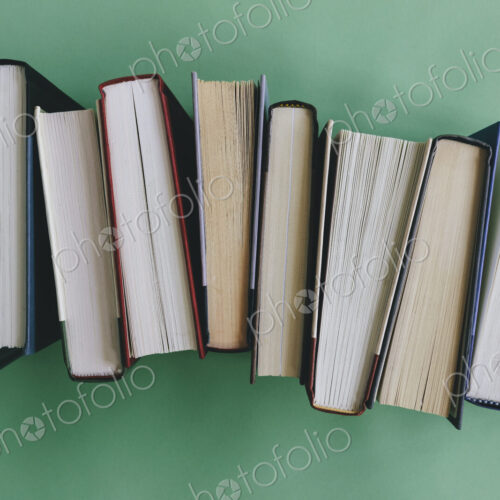 Arrangement of hardback books Arrangement of hardback books