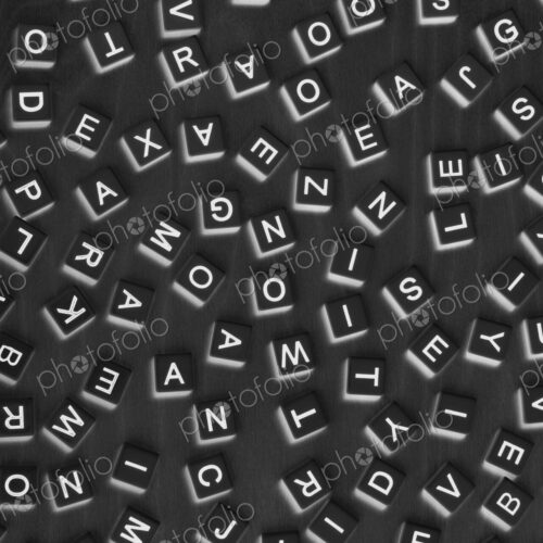 Arrangement of small blocks of scattered letters Arrangement of small blocks of scattered letters