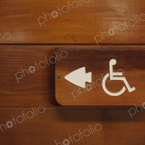 Arrow and wheelchair sign, Olympic National Park, WA, USA Arrow and wheelchair sign, Olympic National Park, WA, USA