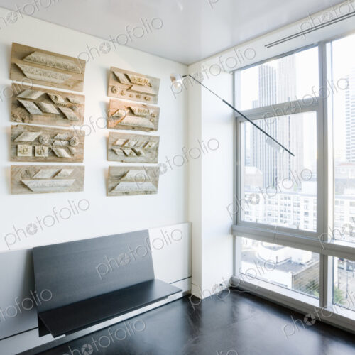 Art and Bench on Wall