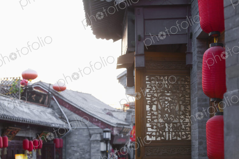 Asian Buildings With Red Lamps