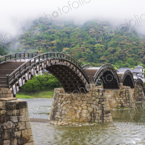 Asian Pedestrian Bridge Over a River Asian Pedestrian Bridge Over a River