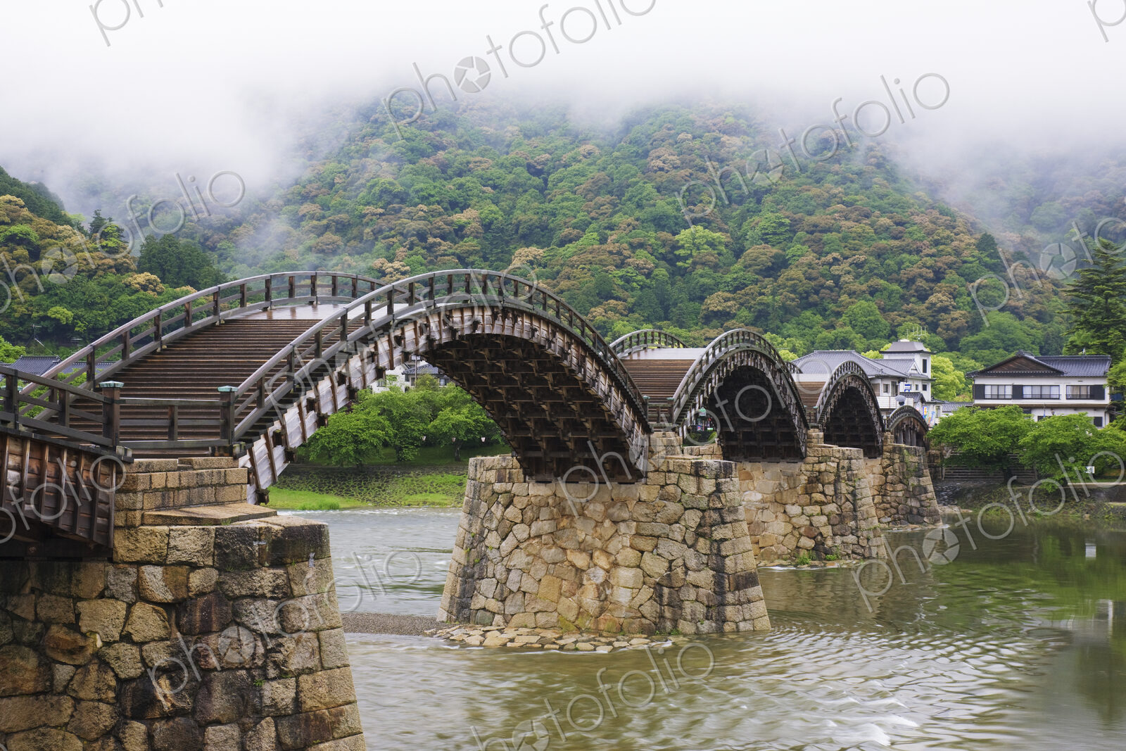 Asian Pedestrian Bridge Over a River