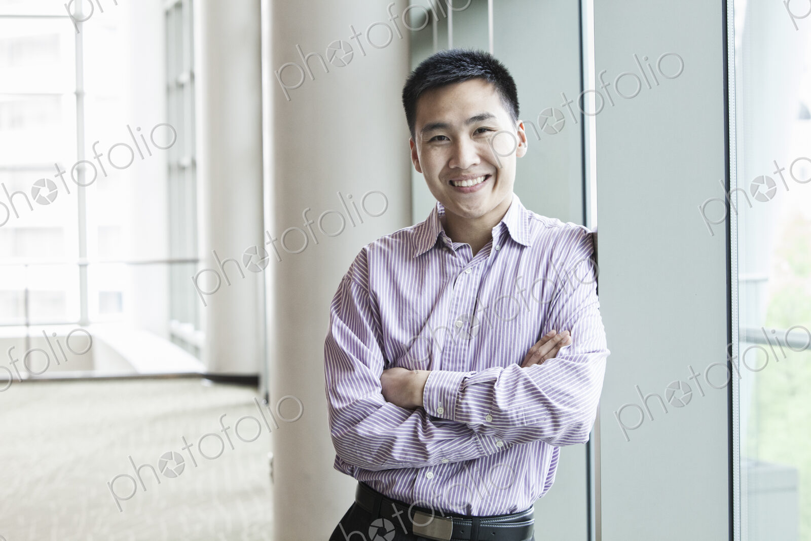 Asian businessman in a business center lobby.