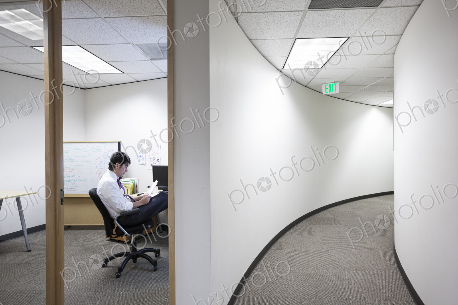 Asian businessman working alone in his office