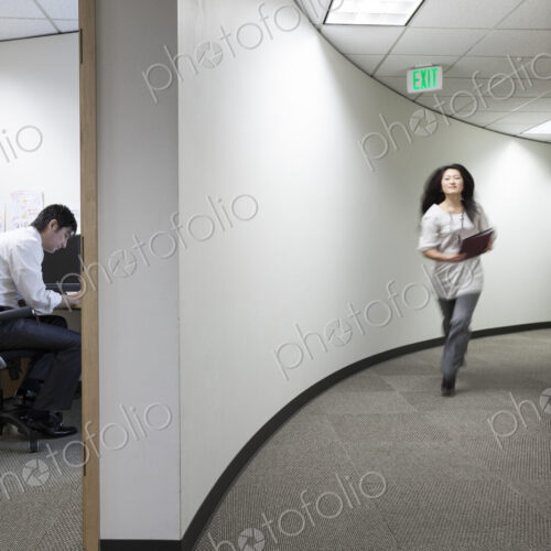 Asian businessman working alone in his office Asian businessman working alone in his office