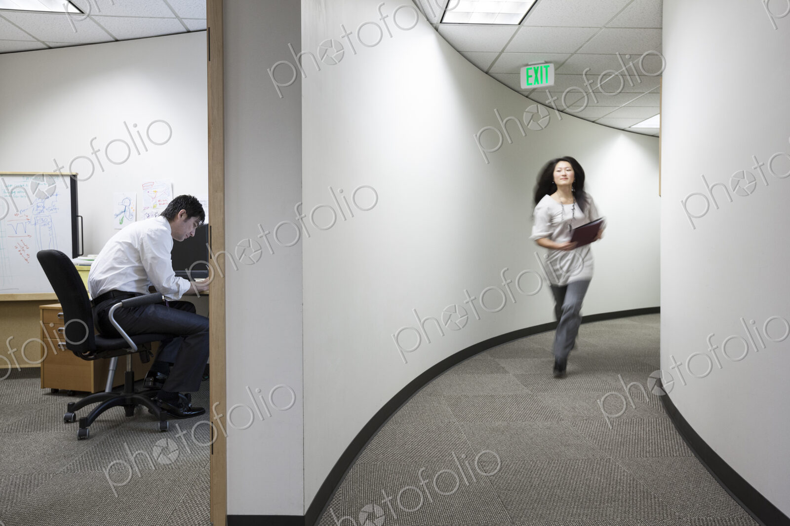 Asian businessman working alone in his office
