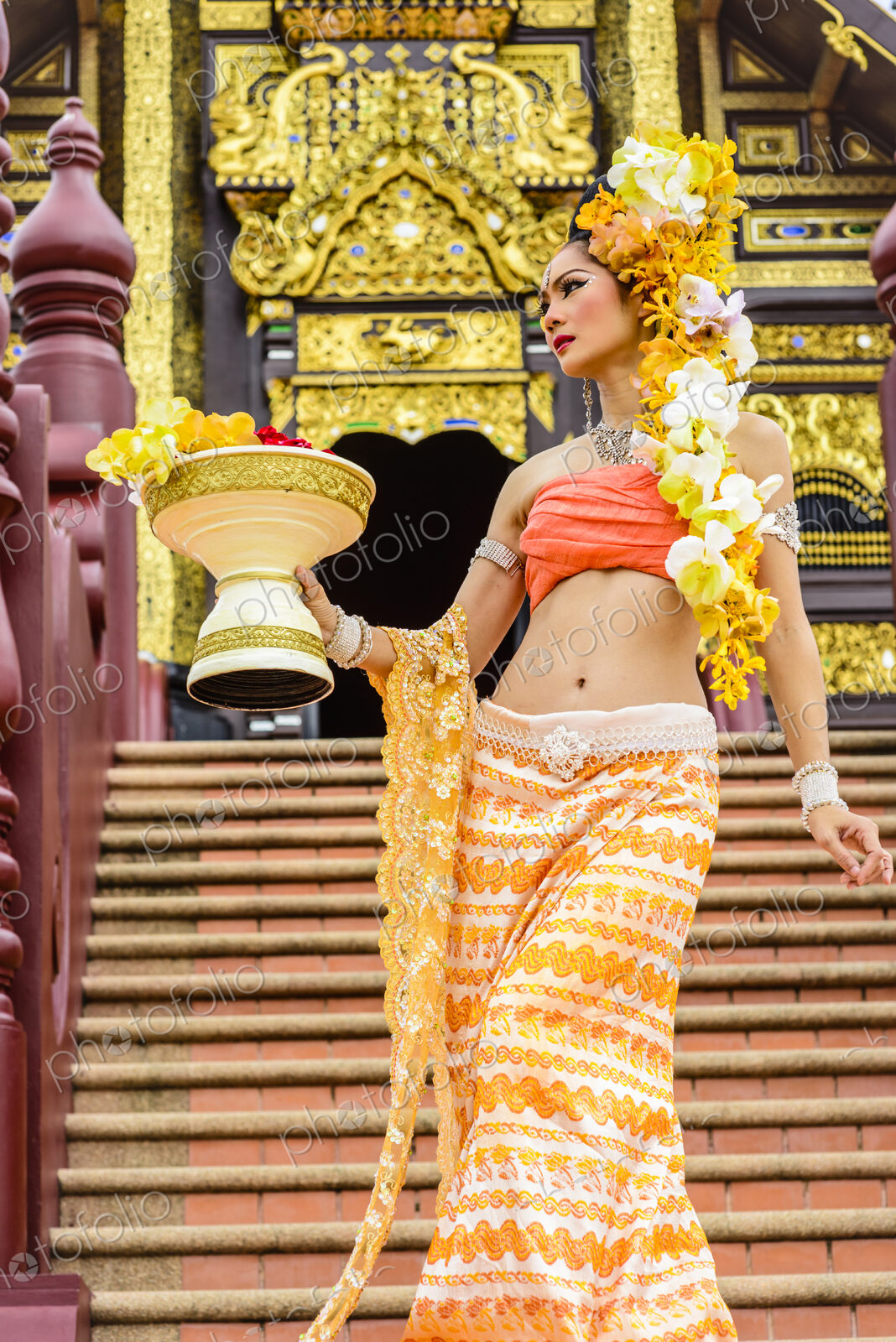 Asian woman at ornate Buddhist temple, Chiang Mai, Chiang Mai, Thailand