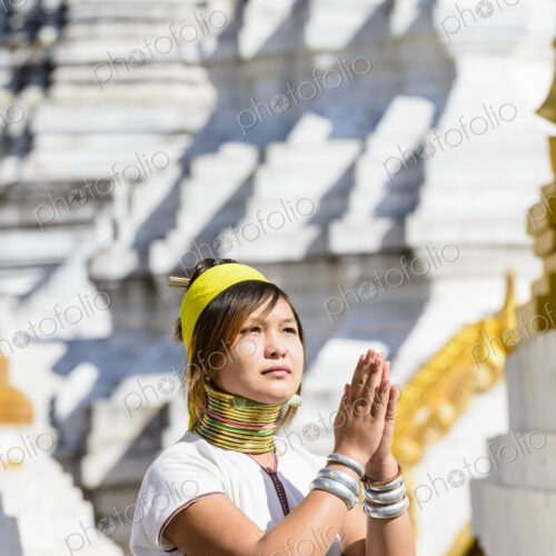 Asian woman doing traditional dance at temple Asian woman doing traditional dance at temple