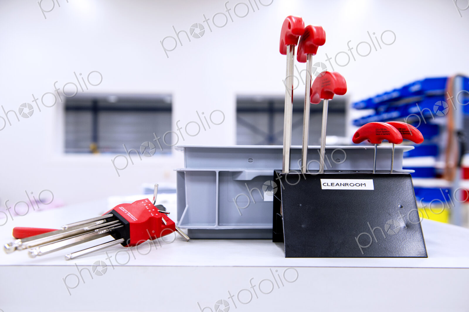 Assorted set of Allen keys on a table and in a designated stand in a clean room, used…
