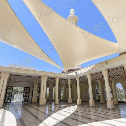 Atrium of a mosque with sun sails giving shade, Aqaba, Jordan. Atrium of a mosque with sun sails giving shade, Aqaba, Jordan.