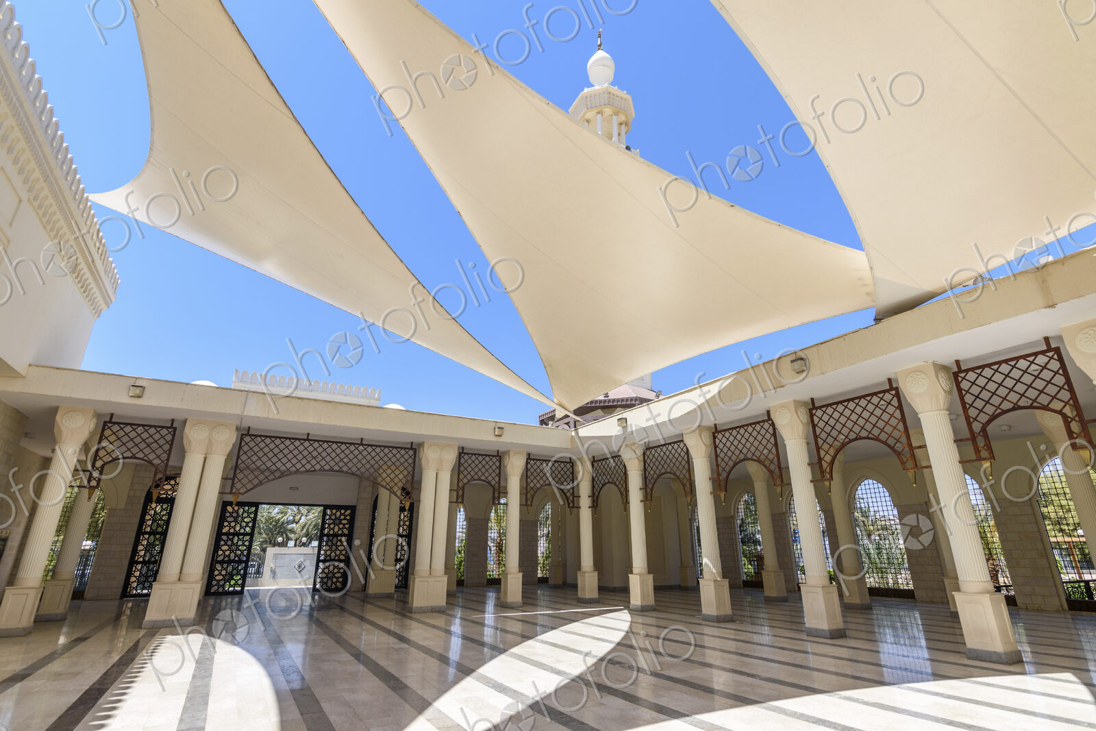 Atrium of a mosque with sun sails giving shade, Aqaba, Jordan.