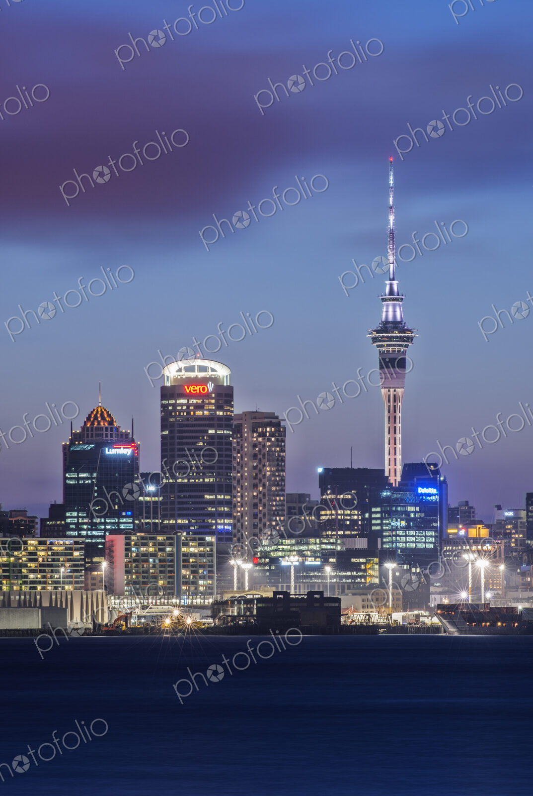 Auckland skyline lit up at night, New Zealand