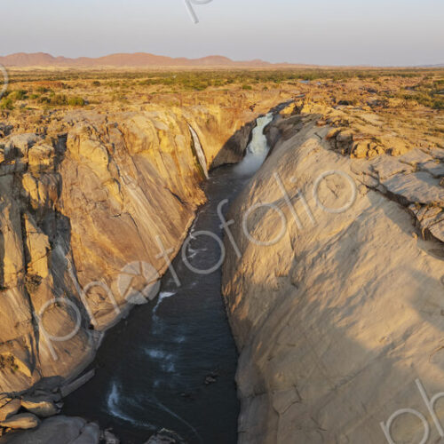Augrabies Falls at Sunset, elevated view of a deep gorge and the Orange River. Gorge…