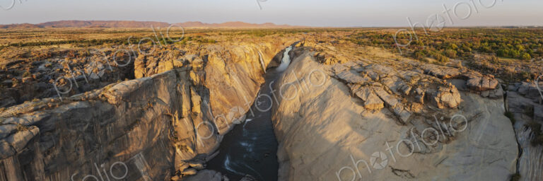 Augrabies Falls at Sunset, elevated view of a deep gorge and the Orange River. Gorge…