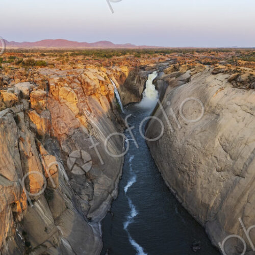 Augrabies Falls at Sunset, elevated view of a deep gorge and the Orange River. Gorge…