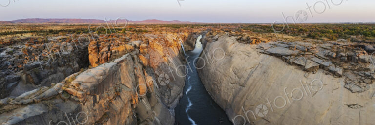 Augrabies Falls at Sunset, elevated view of a deep gorge and the Orange River. Gorge…
