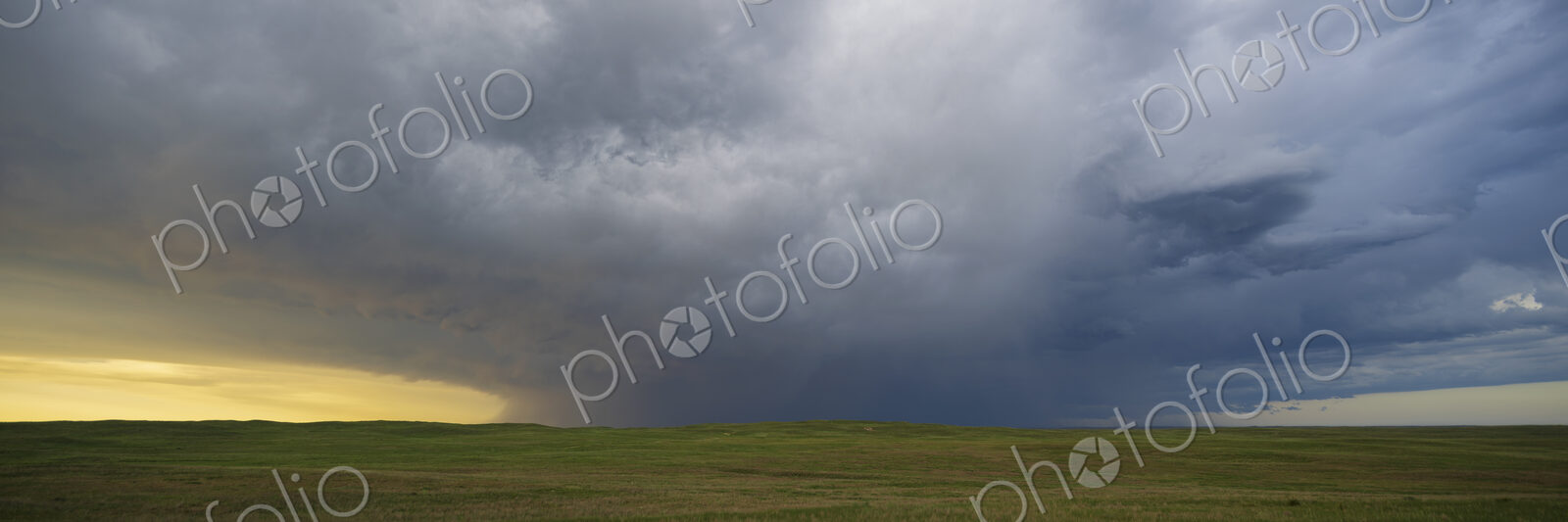 Back Side of a Receding Storm, clouds reaching to the ground on the horizon, North…