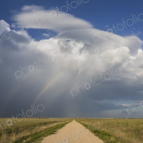Back Side of a Supercell with a Double Rainbow; Back Side of a Supercell with a Double Rainbow;